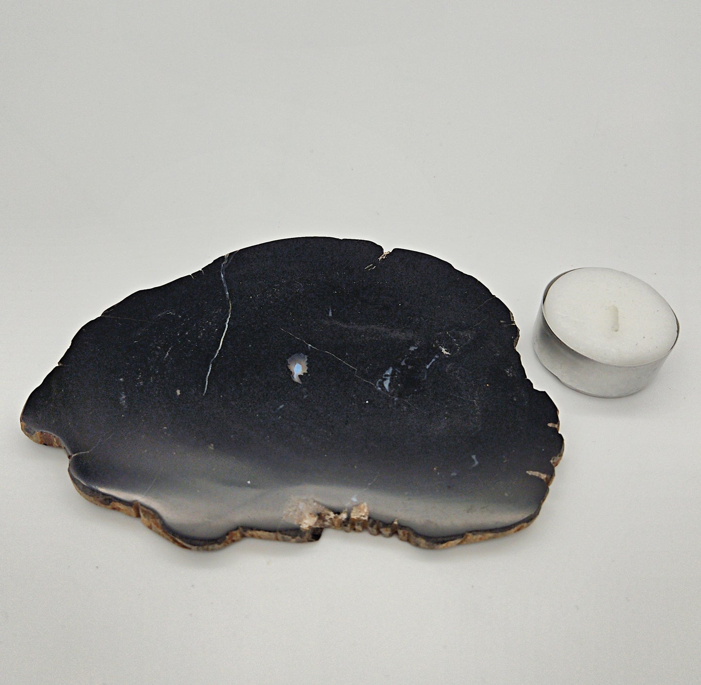 Skulpturel bordskåner