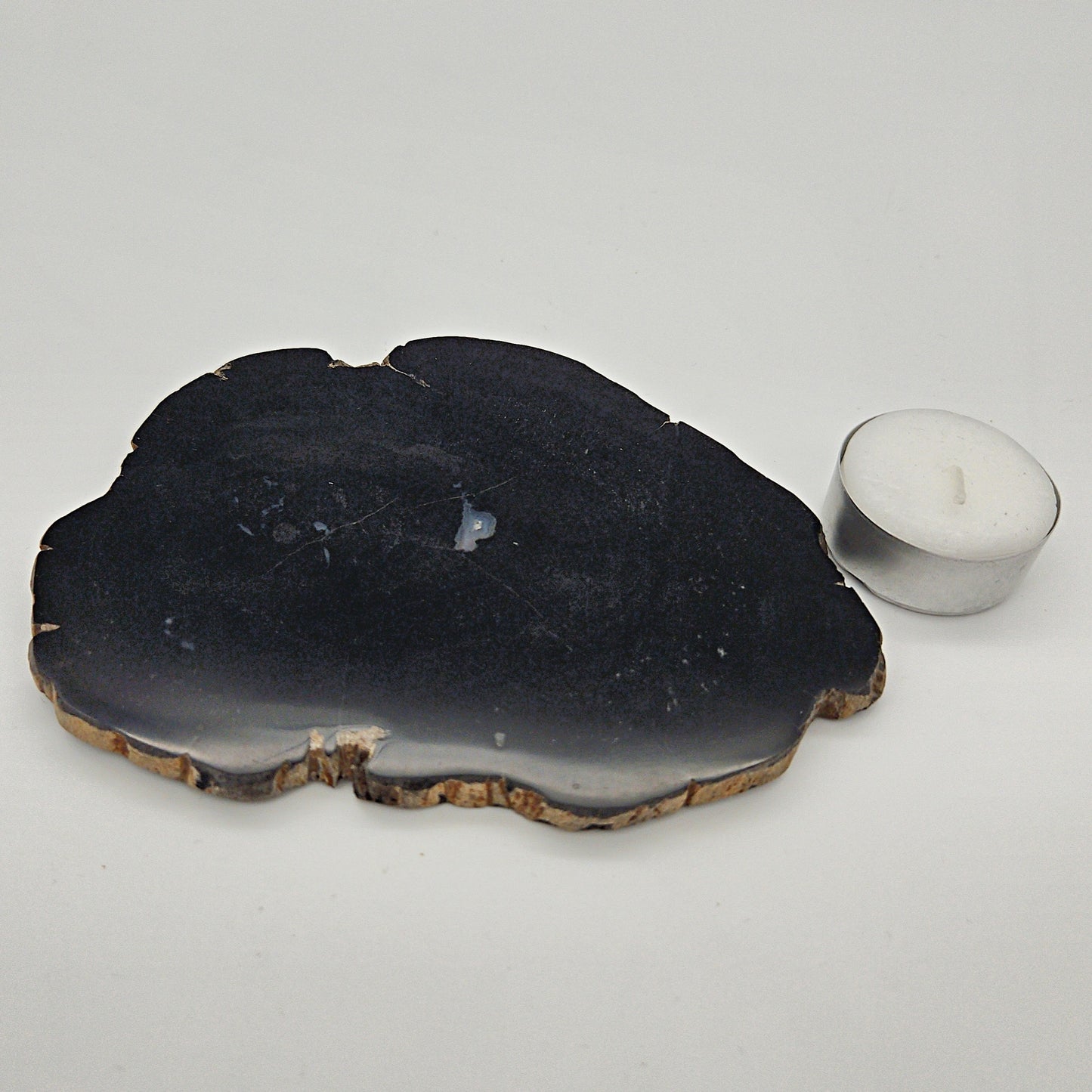 Skulpturel bordskåner