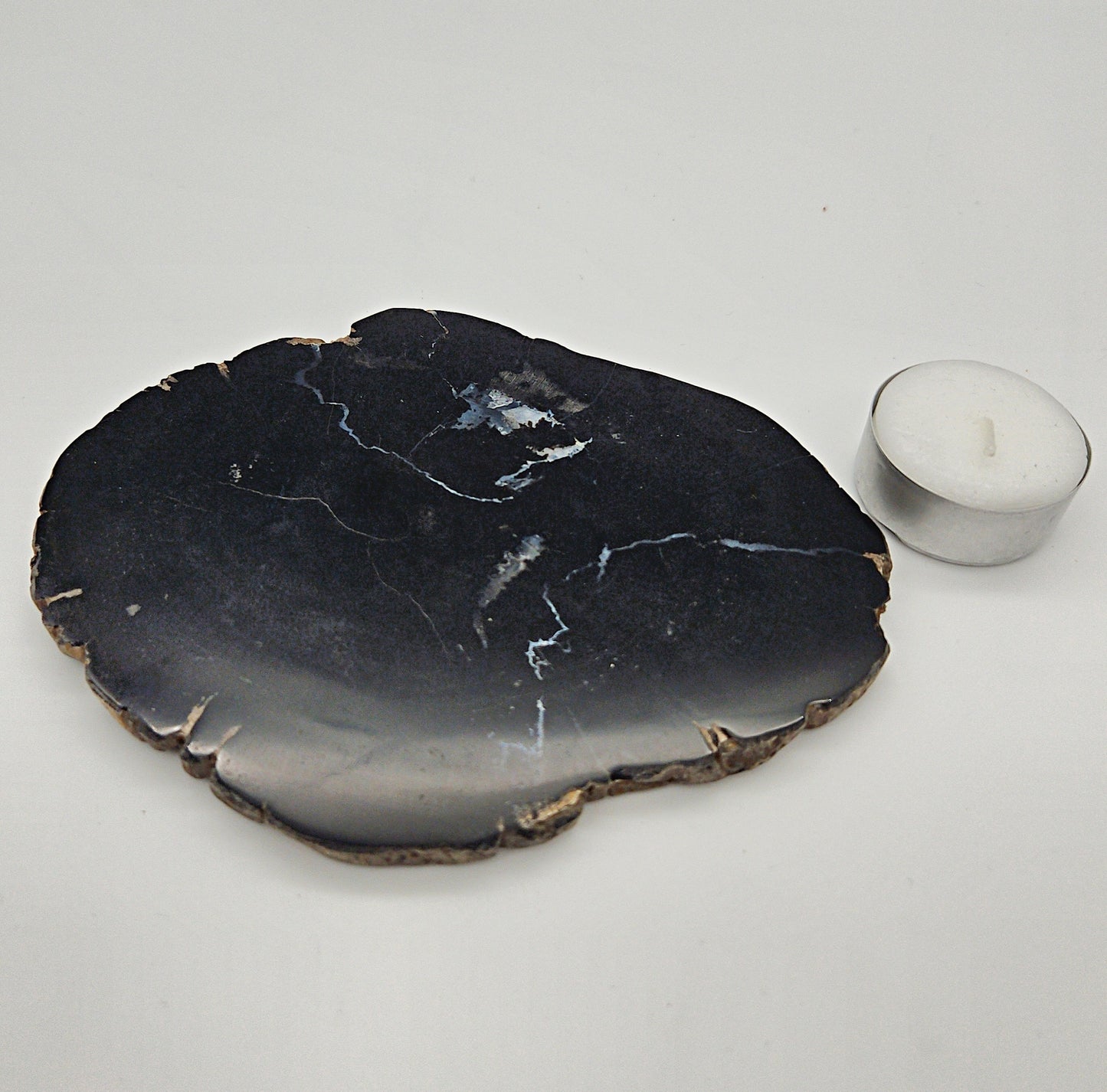 Skulpturel bordskåner