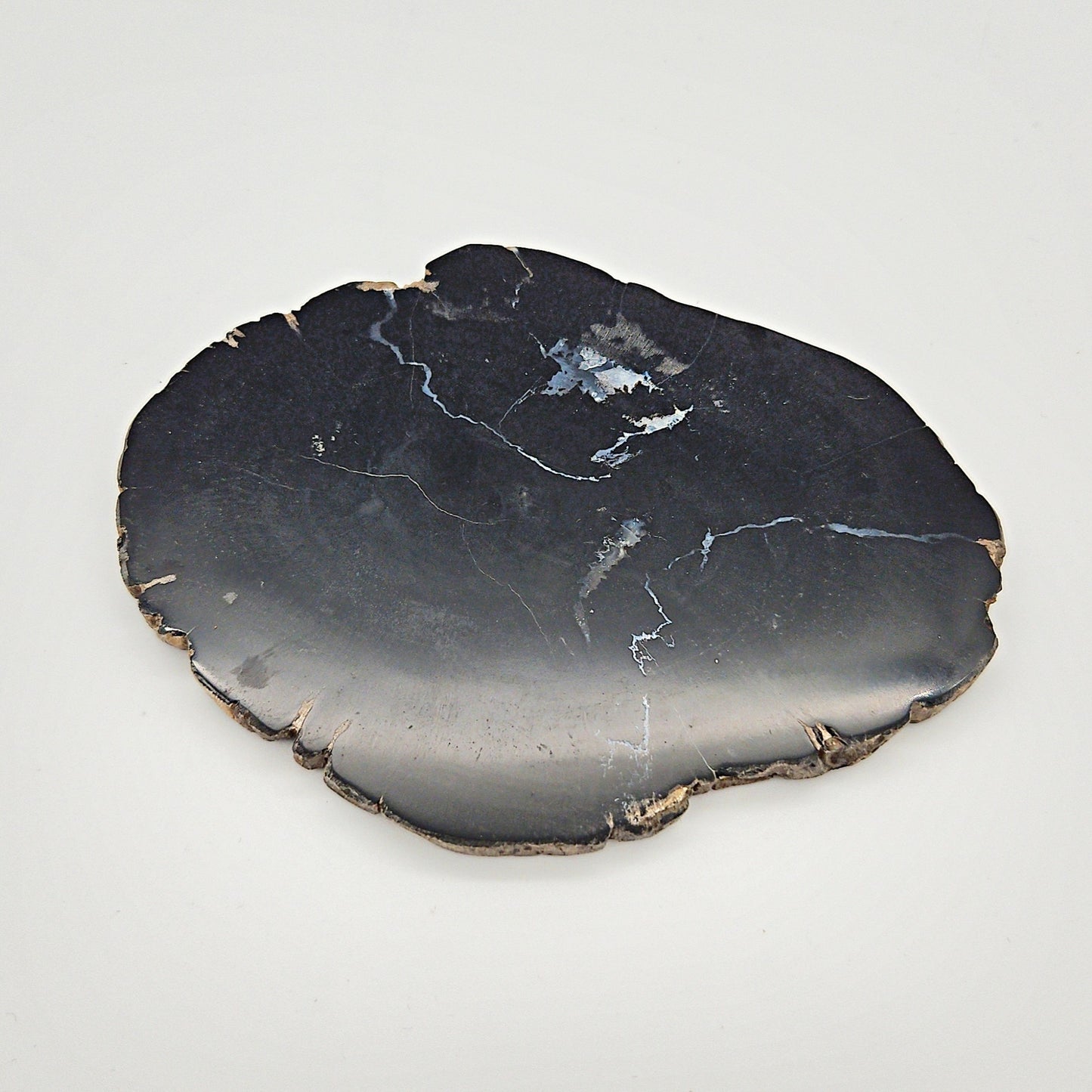 Skulpturel bordskåner