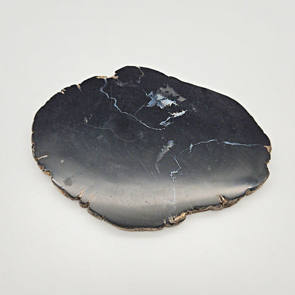 Skulpturel bordskåner