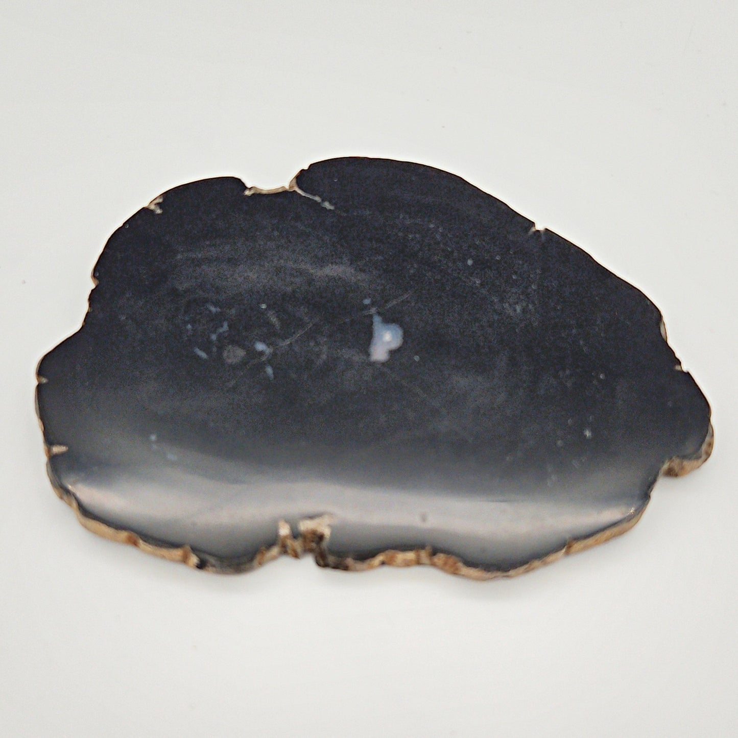 Skulpturel bordskåner