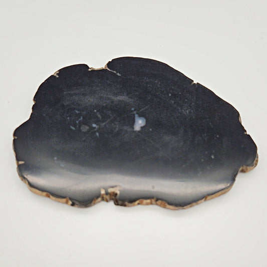 Skulpturel bordskåner