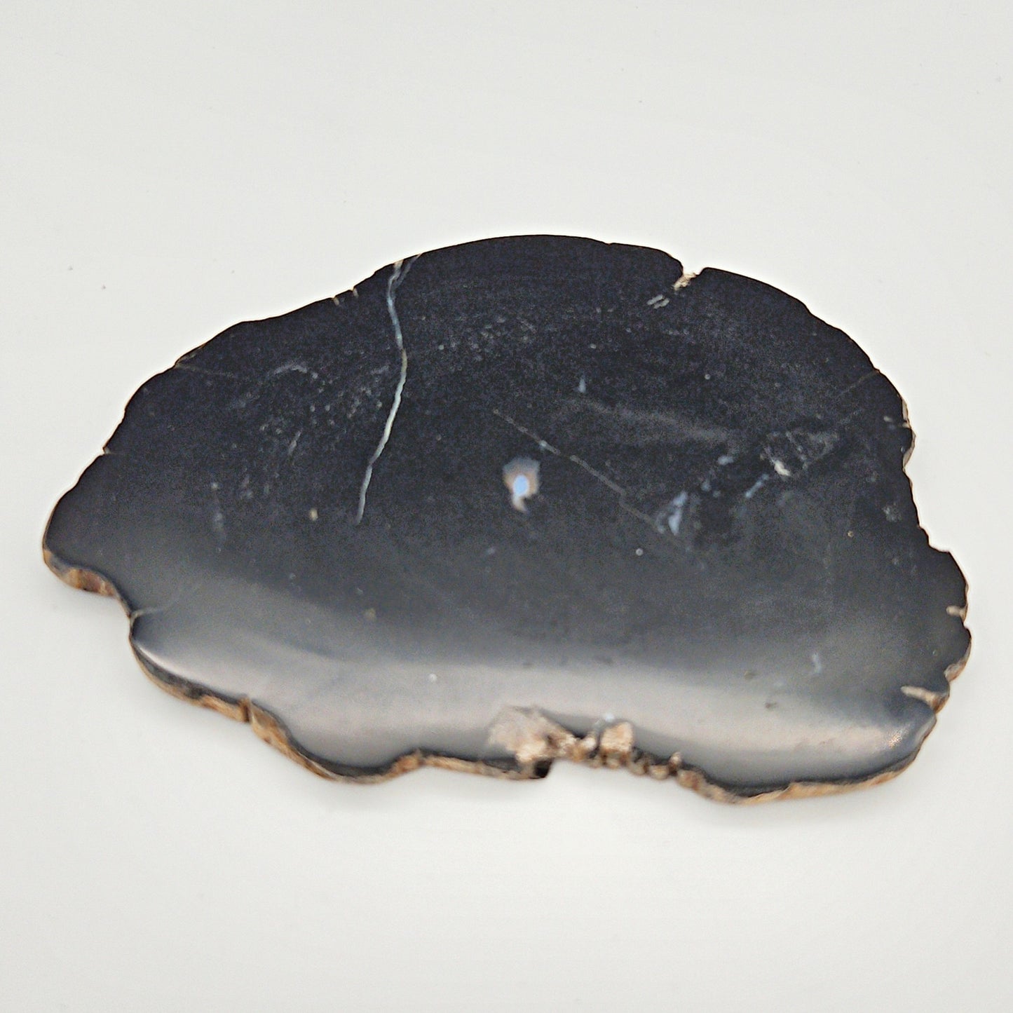 Skulpturel bordskåner