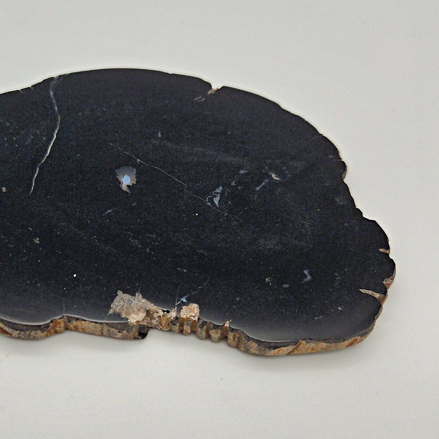 Skulpturel bordskåner