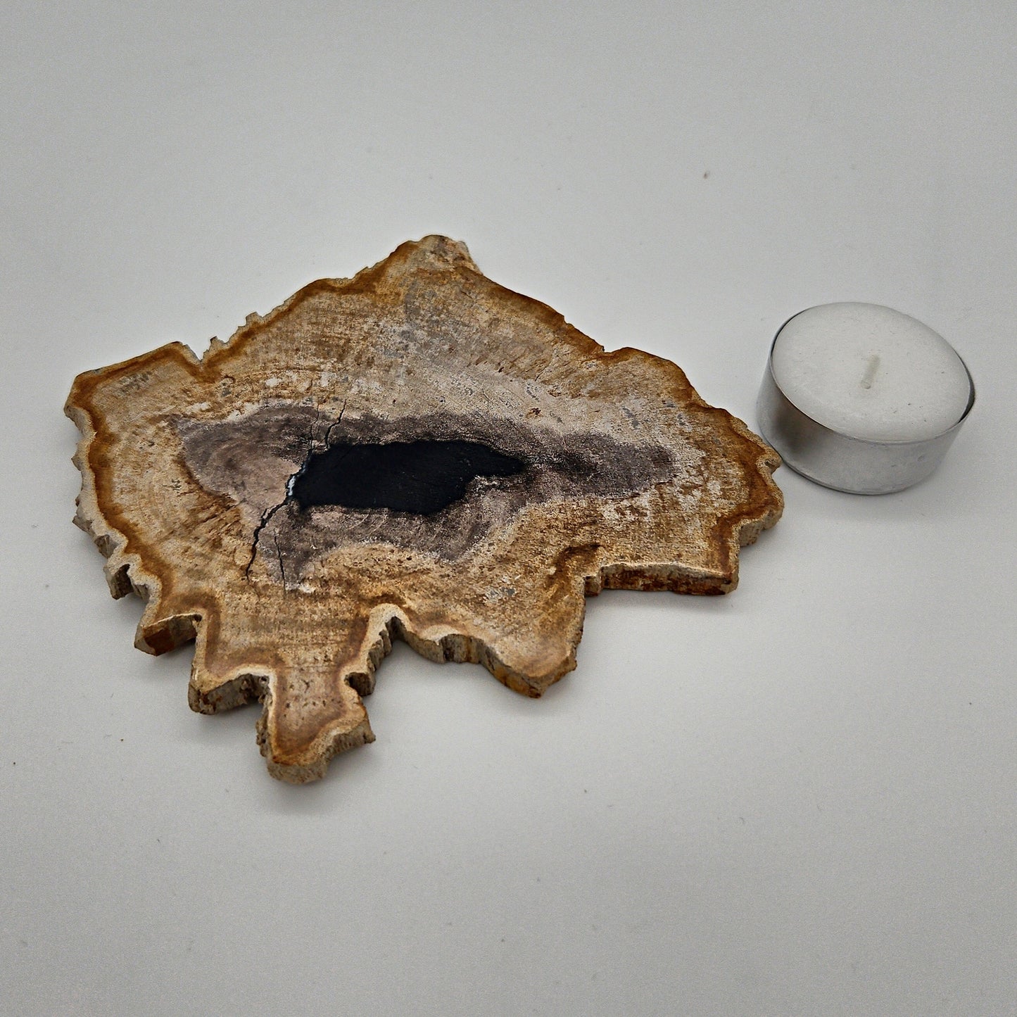 Skulpturel bordskåner